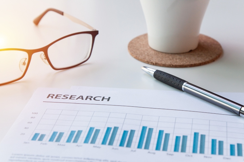 close up view of glasses on business marketing report meeting and briefing